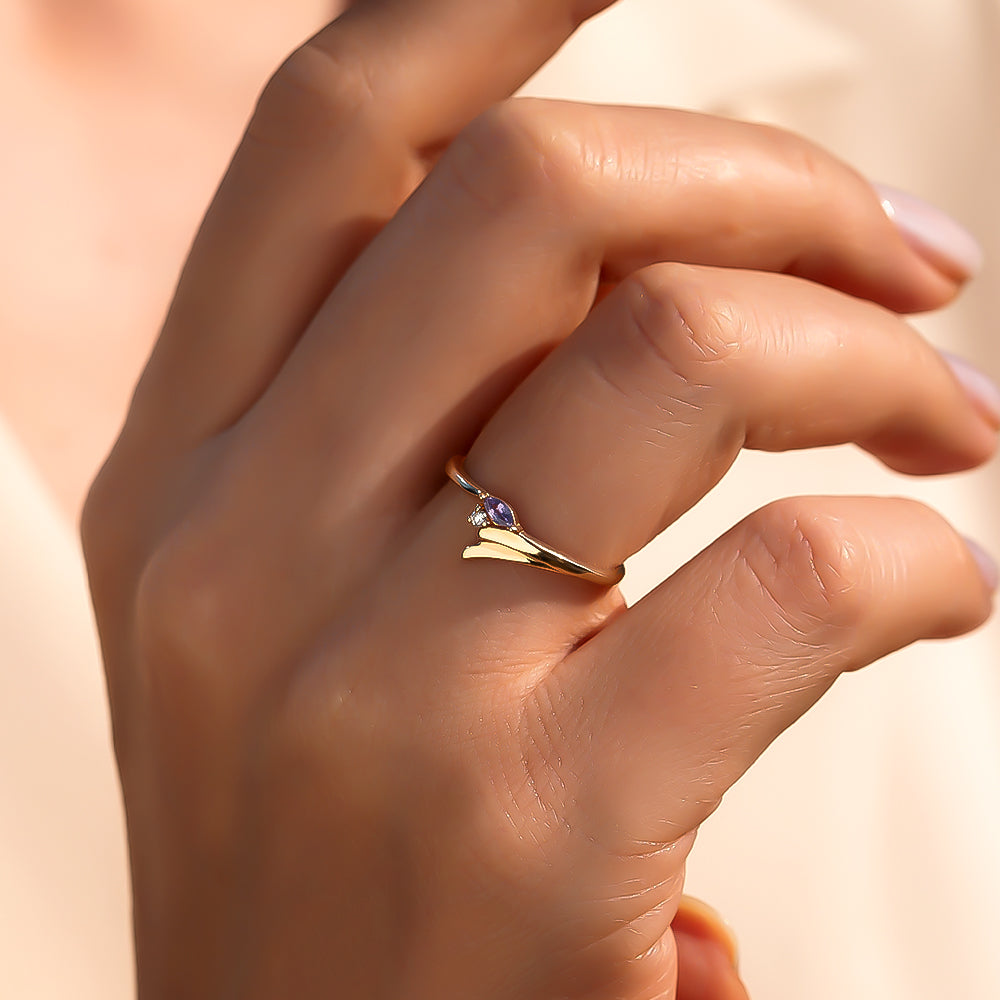 markiz kesim safir taşlı ve pırlantalı kuş kanadı tasarımlı altın yüzük